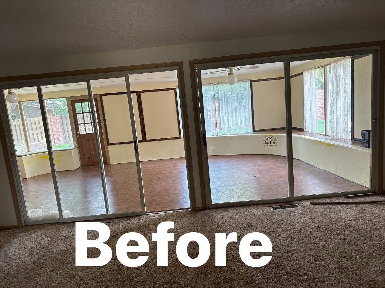 Before: empty bedroom with worn carpet and old sliding patio doors in East El Paso